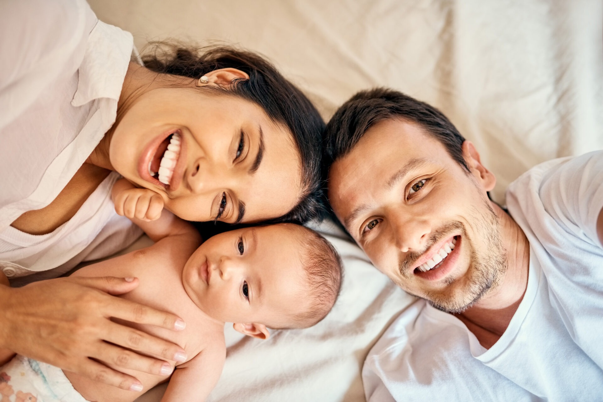 high angle shot of a happy mother and father takin 2023 11 27 05 03 28 utc Чому ми?
