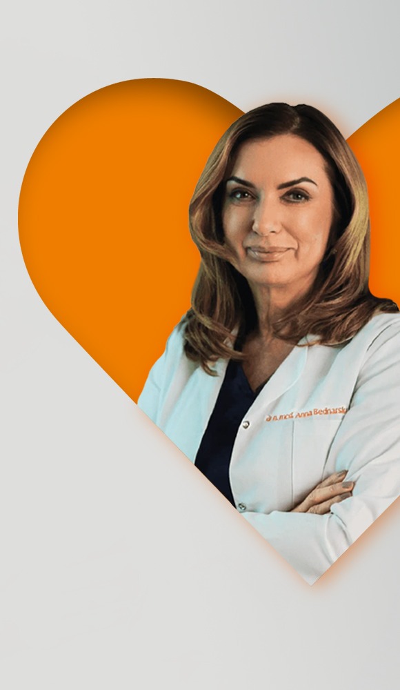 dr Anna Bednarska Czerwińska na tle pomarańczowego serca